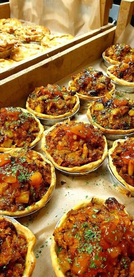 Mini savoury tarts with herb glaze and fresh parsley